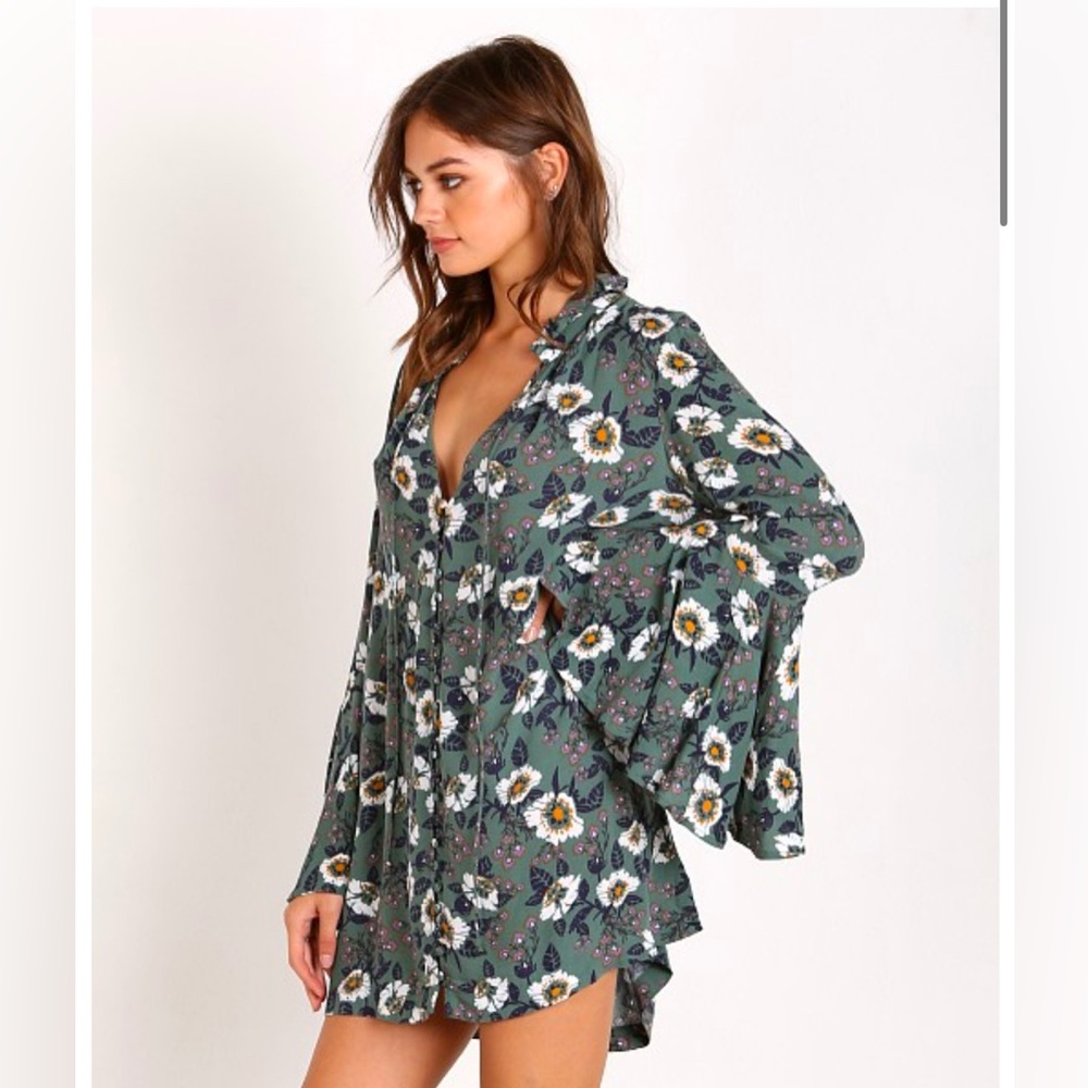 Free people dress tonic. Green with flowers. Size Small